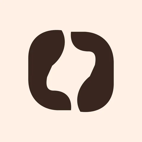 The $NAME token: the Hood Name mark in cocoa on a peach coin.
